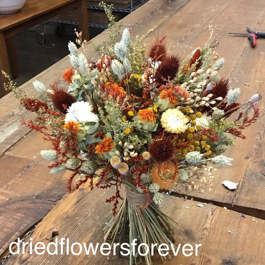 burnt orange dried flower bouquet wedding