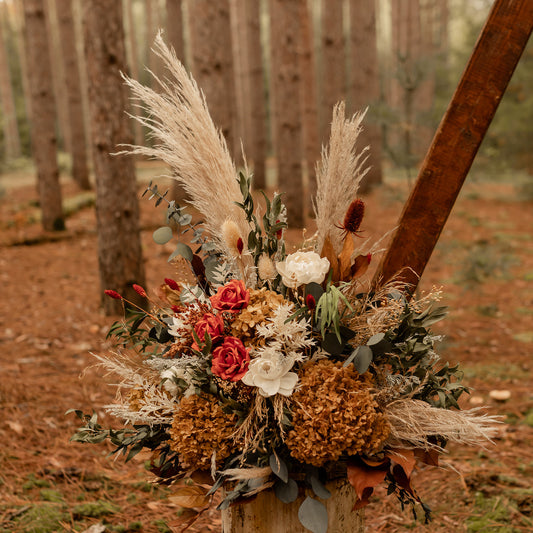 large dried flower orange fall arrangement rental whiskey barrel floral